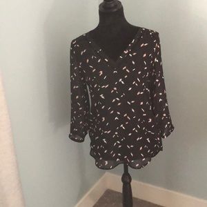 Maurice’s black blouse